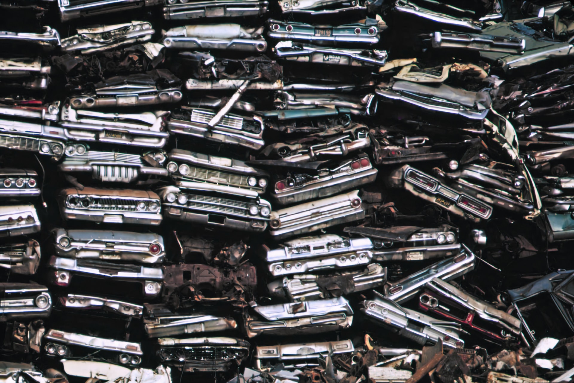 Stacked cars in a junkyard, Philadelphia | Veteran Car Donations 