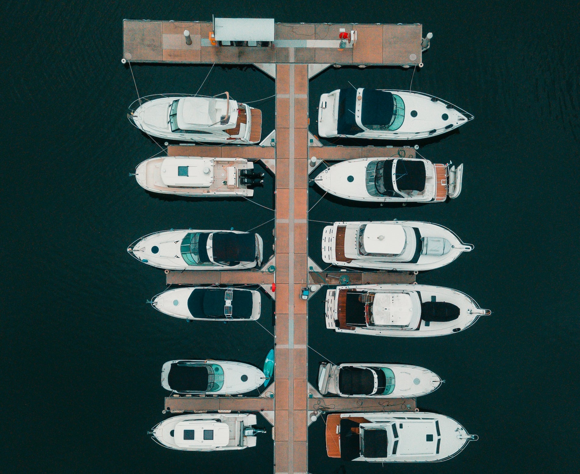 Airial Shot Of Different Kinds Of Boats In The Dock | Veteran Car Donations