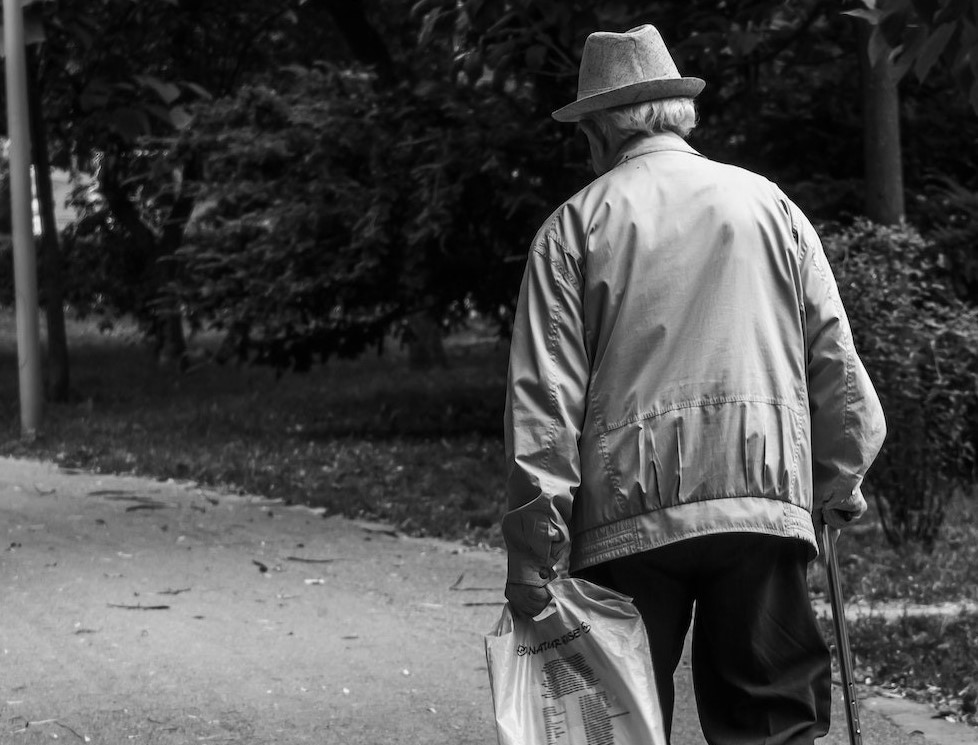 Monochrome Photo Of An Old Man | Veteran Car Donations