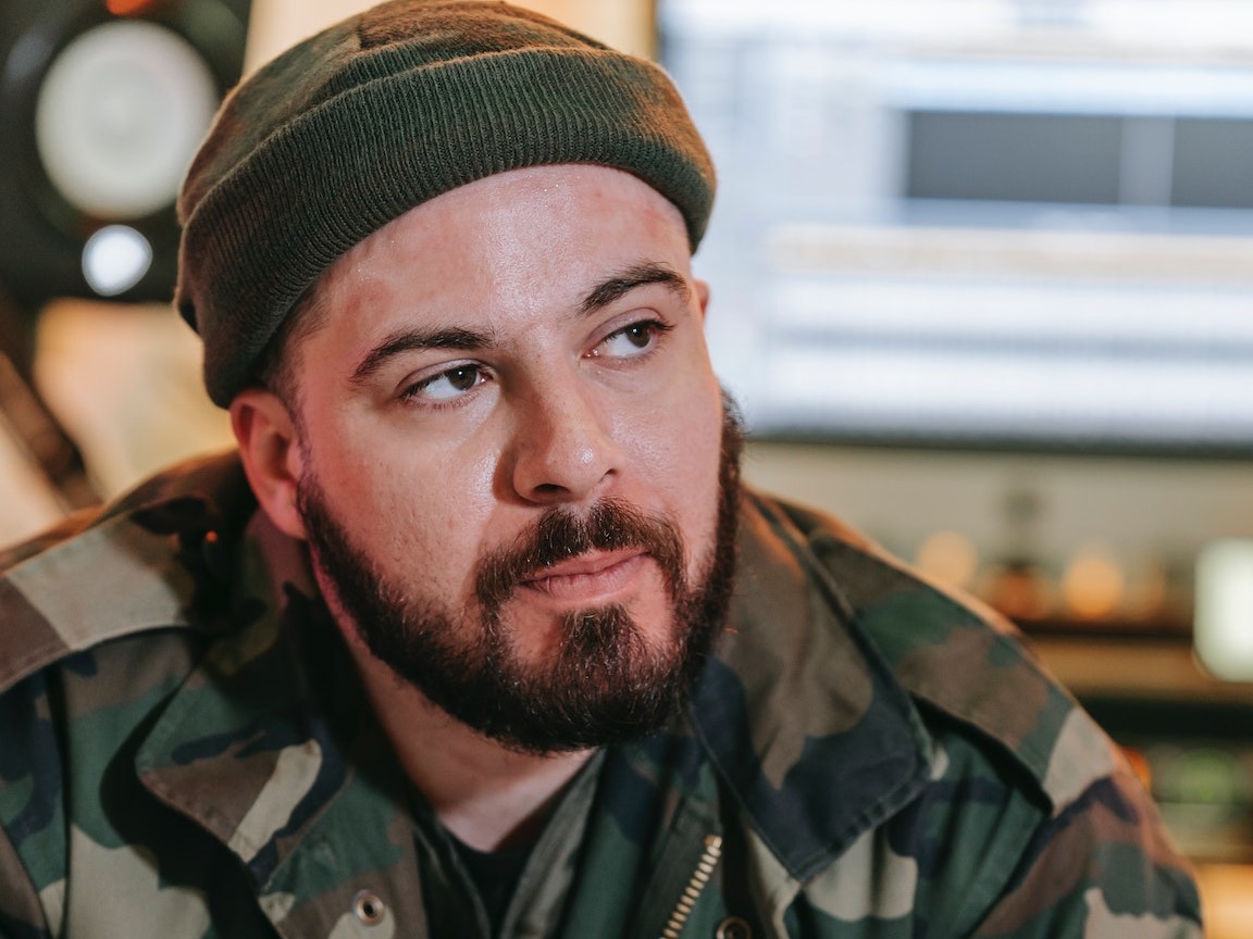 Man in Camouflage Military Uniform | Veteran Car Donations