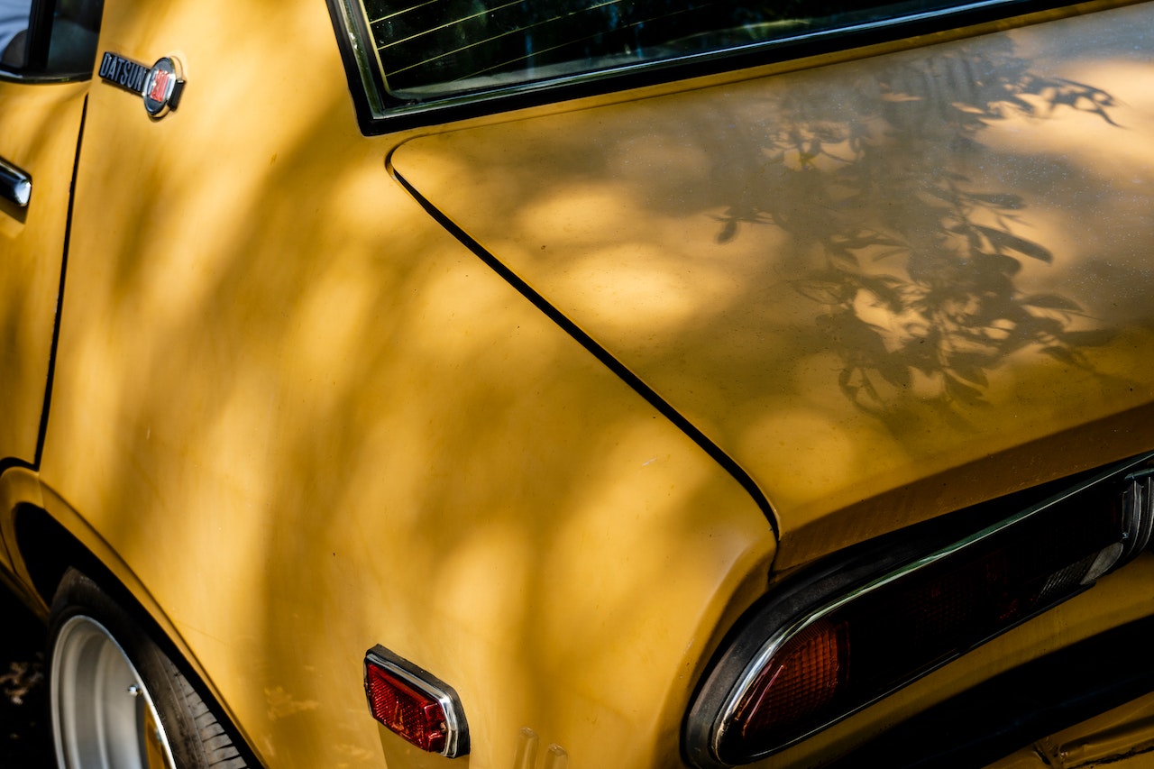 Yellow Classic Datsun Car | Veteran Car Donations
